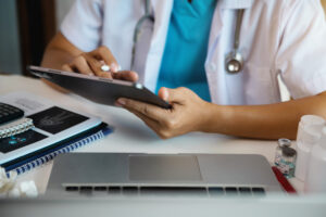 Doctor work on digital tablet healthcare doctor technology table