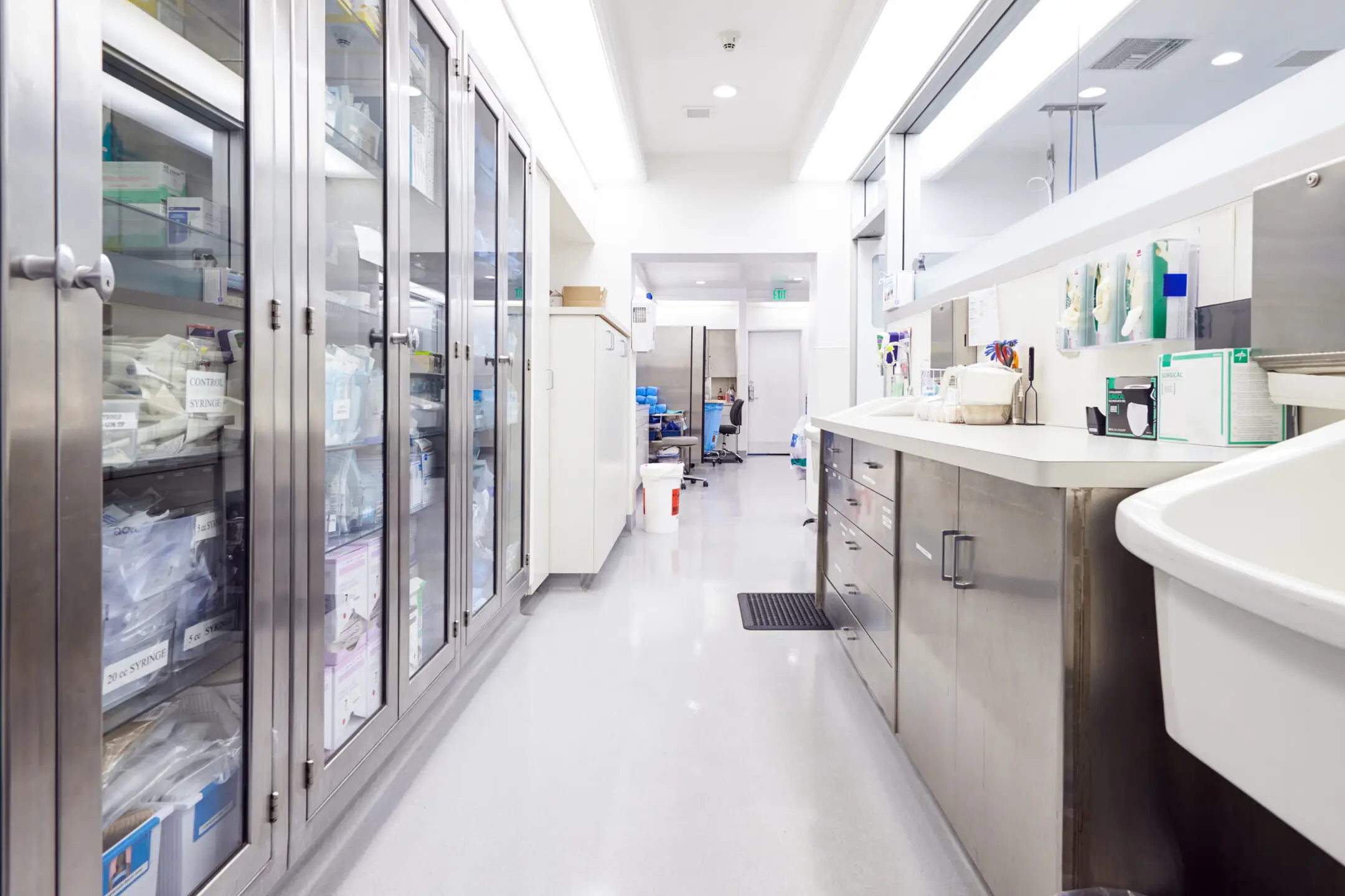 Empty storage room with supplies, illustrating how HUB supports Ambulatory Surgery Centers (ASCs) with medical inventory management, care coordination, integrated healthcare, and healthcare communication.