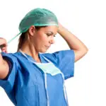 Vendor with hat - Clinical professional using HUB Healthcare to collaborate, highlighting healthcare communication, integrated healthcare, care coordination, and patient management software.