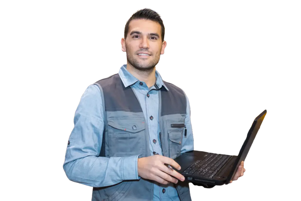 Male healthcare professional with a laptop, highlighting healthcare analytics, care coordination, patient management software, and integrated healthcare.