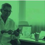 Physician using HUB Healthcare on a mobile device